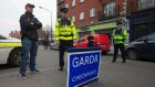 Gardaí at a checkpoint on Francis Street in Dublin. Photograph: Gareth Chaney/Collins
