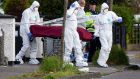 A body is removed from the scene of the shooting at Kilbarron Avenue,    Coolock, Dublin.  Photograph: Tom Honan 