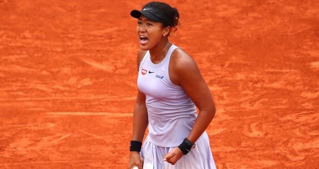 Naomi Osaka is into the third round at Roland Garros after victory over Victoria Azarenka. Photograph: Clive Brunskill/Getty