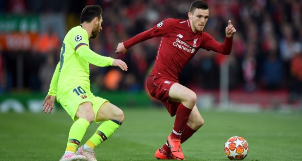 Liverpool’s Andy Robertson  takes on Lionel Messi of Barcelona during their epic Champions League semi-final at Anfield. Photograph: Shaun Botterill/Getty Images