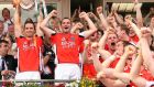 Armagh’s Paul McGrane lifts the trophy after victory over Fermanagh in the Ulster football final replay in 2008. Photograph: Cathal Noonan/Inpho