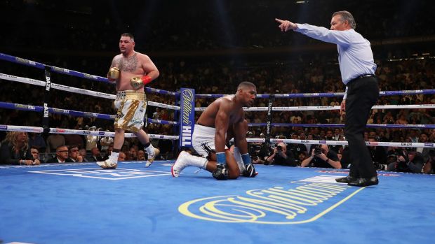 Andy Ruiz Jr knocks down Anthony Joshua during the seventh round in New York. Photograph: Al Bello/Getty
