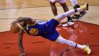 Golden State Warriors center DeMarcus Cousins dives for the ball during his side’s win over the Toronto Raptors. Photograph: Warren Toda/EPA