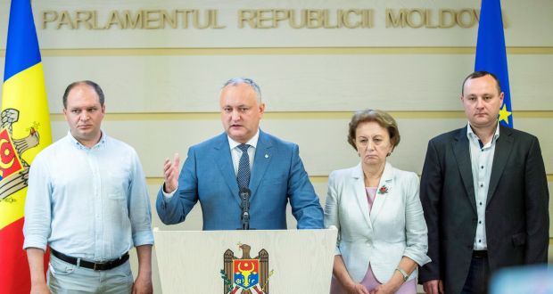 President of Moldova Igor Dodon, second from left, during a briefing in the parliament building in Chisinau, Moldova. Photograph: Dumitru Doru/EPA