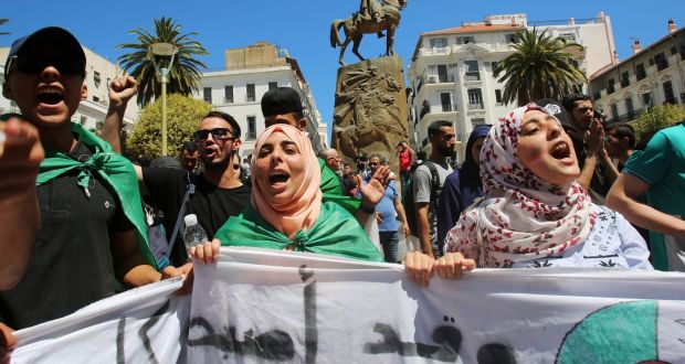 Protesting students demand the removal of the ruling elite in Algiers. Photograph: Ramzi Boudina/Reuters