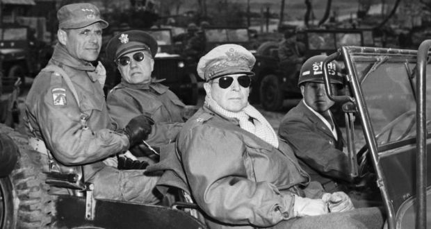 Right, Gen Douglas MacArthur, commander in chief visits  the front in Korea. Photograph: Bettmann Archive