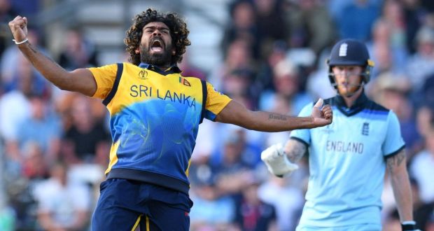  Sri Lanka’s Lasith Malinga celebrates taking the wicket of England’s Jos Buttler as Ben Stokes looks on during the Cricket World Cup game at Headingley.  Photograph: Oli Scarff/AFP/Getty Images
