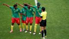 Cameroon’s Augustine Ejangue, Gabrielle Aboudi Onguene, Ajara Nchout and Gaelle Enganamouit complain to referee Qin Liang during their defeat to England. Photograph: John Walton/PA