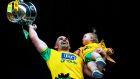 Donegal’s Paddy McGrath lifts the Anglo-Celtic Cup with his daughter Isla Rose after beating Cavan in the Ulster Football Championship final in St Tiernach’s Park, Clones, Co. Monaghan. Photograph:  Tommy Dickson/Inpho