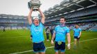 Dublin’s Brian Howard holding aloft the  Delaney Cup after victory over Meath in the Leinster Championship final in Croke Park. Photograph: Ryan Byrne/Inpho