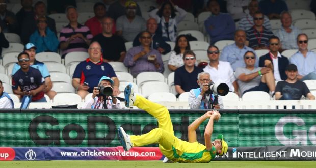 Pat Cummins takes a catch off the bowling of Mitchell Starc to dismiss England captain Eoin Morgan. Photograph:  Michael Steele/Getty Images