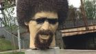 The Luke Kelly statue after being daubed with black paint.