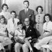 Joseph P. Kennedy and his wife Rosemary Kennedy pose with their nine children for this picture in 1938 at Bronxville. From left are, seated: Eunice, Jean, Edward (on lap of his father), Patricia, and Kathleen. Standing: Rosemary, Robert, John, Mrs Kennedy, and Joseph, Jr. Photograph: Boston Globe/AP Photo