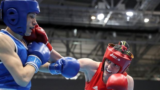 Ireland’s Michaela Walsh (right) in action against Bulgaria’s Stanimira Petrova during the women’s featherweight final at the European games in Minsk. Photograph: Martin Rickett/PA Wire