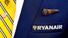  Ryanair logo is pictured on the the jacket of a cabin crew member. File Photograph: Francois Lenoir/Reuters 