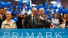 Arthur Ryan, centre, talks with Primark chief executive  Paul Marchant in  2014. ‘I was fortunate enough to work closely with him and experience first-hand his sharp mind and innovative thinking,’ Mr Marchant said. Photograph: Javier Barbancho/Reuters