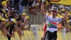 South Africa’s Daryl Impey celebrates his victory in stage nine of the Tour de France. Photograph:  Marco Bertorello/AFP