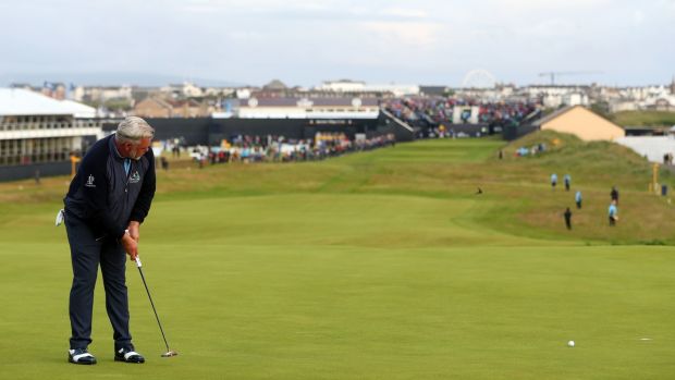 Clarke putts for birdie on the first. Photo: David Davies/PA Wire
