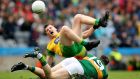 Donegal’s Jamei Brennan  and Kerry’s Mark Griffin take a tumble during yesterday’s quarter-final phase two clash at Croke Park. Photograph: Ryan Byrne/Inpho 