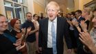 Britain’s new prime minister Boris Johnson being clapped into 10 Downing Street by staff in London on Wednesday. Photograph: Stefan Rousseau/AFP/Getty Images