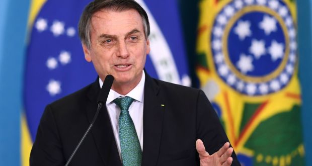 Brazilian president Jair Bolsonaro: “A scoundrel, to avoid a problem like this, he marries another scoundrel and adopts children in Brazil.” Photograph: Evaristo Sa