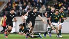 Beauden Barrett in action against South Africa during the Rugby Championship. Photograph: Hagen Hopkins/Getty