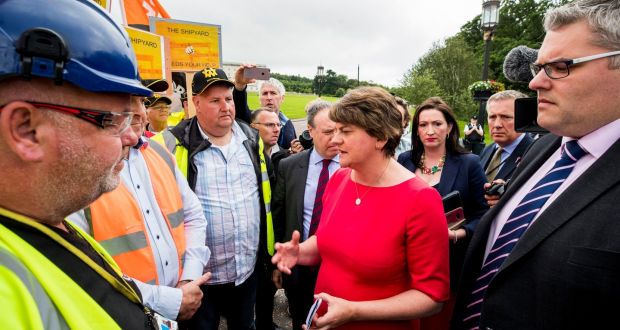 DUP leader Arlene Foster and Gavin Robinson speak with steelworker Joe Passmore (left) from Unite, following a meeting with prime minister Boris Johnson at Stormont on Wednesday.  Photograph: Liam McBurney/PA Wire 