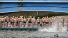 Participants line up for the 100th Liffey Swim. Photograph: Dara Mac Donaill / The Irish Times