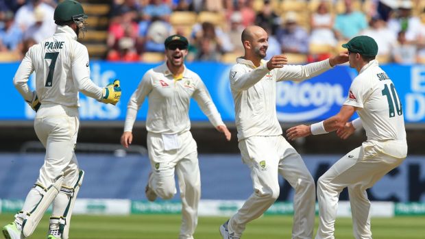 Australia’s Nathan Lyon celebrates taking the wicket of Joe Root. Photograph: Lindsey Parnaby/AFP/Getty