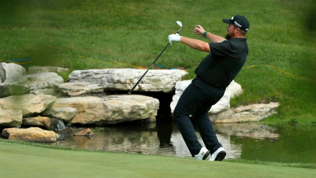 Shane Lowry reacts after a shot on the 16th hole during the first round of The Northern Trust at Liberty National Golf Club in Jersey City. Photograph: Kevin C Cox/Getty Images