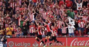 Athletic Bilbao celebrate Aritz Aduriz’s late winner against Barcelona. Photograph: Vincent West/Reuters