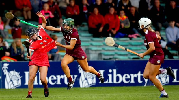 Galway’s Heather Cooney challenges Cork’s Amy O’Connor during the Liberty Insurance All-Ireland Senior Camogie Championship semi-final at the LIT Gaelic Grounds in Limerick. Photograph: Ryan Byrne/Inpho