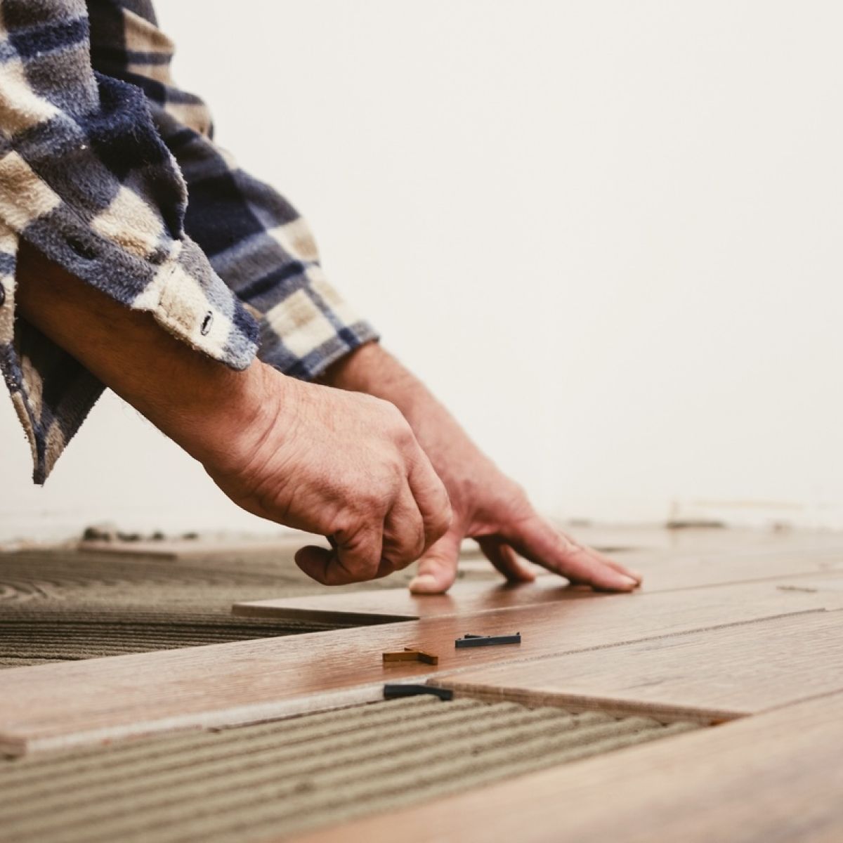 Our new floors have started creaking loudly. What can we do?