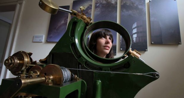  The Grubb coelostat and Einstein lens with PhD student Maria Koutoulak. The coelostat will go on display. File photograph: Mark Stedman