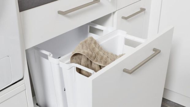 Allocated deep drawers, like these by Kube Kitchens, to each member of the family for their laundry.