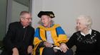 Fr Tony Coote was conferred with an honorary doctorate of science by UCD last December. He is pictured here with Archbishop of Dublin Dr Diarmuid Martin and his mother Patricia. Photograph: Colm Mahady/Fennells 