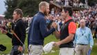 Rory McIlroy congratulates Sebastian Soderberg after the Swede beat him in a play-off in Switzerland. Photograph: Fabrice Coffrini/AFP/Getty