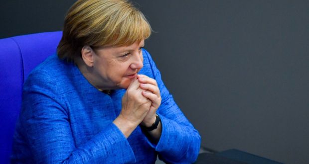 German chancellor Angela Merkel listens after delivering a keynote speech during a debate on the federal budget at the Bundestag,  in Berlin. Photograph: John MacDougall/AFP/Getty Images
