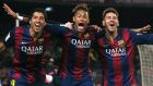 Barcelona’s Luis Suarez, Neymar and Lionel Messi celebrate a goal  at Camp Nou stadium. Photograph: Albert Gea/Reuters 