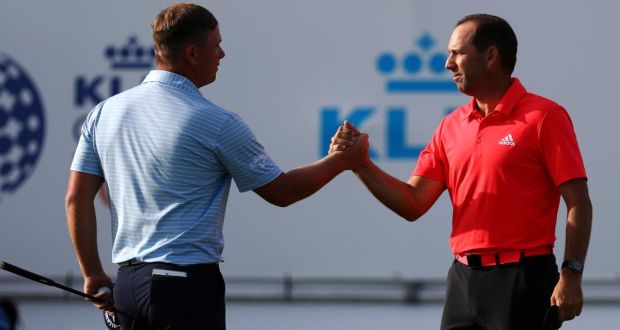 England’s Callum Shinkwin shakes hands with Sergio Garcia  of Spain on the the 18th green after completing the third round  of the KLM Open at The International Golf Course  in Badhoevedorp, Netherlands. Photograph: Dean Mouhtaropoulos/Getty Images