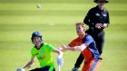 Ireland batsman Harry Tector turns to get back in his ground as  Fred Klaassen of the Netherlands looks to field the ball during the GS Holding T20I Tri-Series clash at Malahide. Photograph: Oisín Keniry/Inpho