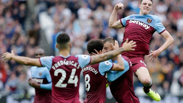 Andriy Yarmolenko of West Ham United celebrates with teammates Felipe Anderson and Declan Rice after scoring his team’s first goal during the Premier League win over Manchester United. Photo: Henry Browne/Getty Images