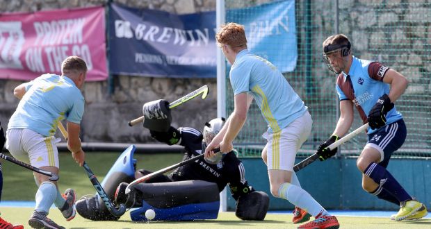Three Rock’s David Kane fails to stop Conor Empey of UCD scoring a goal in the student side’s 3-1 win at the weekend. Photograph:  Bryan Keane/Inpho