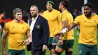 Australia’s head coach Michael Cheika   with his players before their clash with  Fiji at the Sapporo Dome in Sapporo, Japan. Photograph: Getty Images