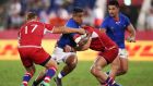  Samoa’s Rey Lee-Lo  is tackled by Bogdan Fedotko and Andrei Polivalov of Russia in Samoa’s 34-9 win in  the  Rugby World Cup   in Kumagaya, Saitama, Japan. Photograph: Cameron Spencer/Getty Images