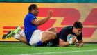 Scotland winger Sean Maitland  is tackled by  Samoa’s wing Ed Fidow leading to a penalty try and a second yellow card for Fidow during the Pool A clash at the Kobe Misaki Stadium. Photograph: Filippo Monteforte/AFP/Getty  