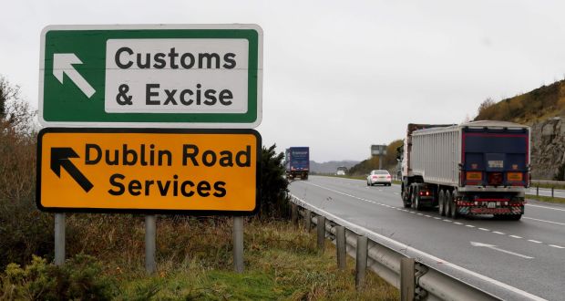 A sign on the main road outside Newry, Northern Ireland, pointing towards an old customs and excise station near the border between Northern Ireland and the Republic. Photograph: AFP 