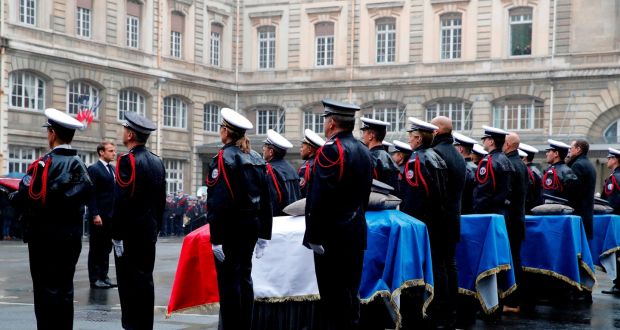 French president Emmanuel Macron participates in a ceremony at Paris police headquarters to pay respects to the victims of an attack on October 4th. Three police officers and an administrative worker were murdered. Photograph: Francois Mori 