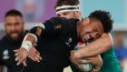 Ardie Savea is tackled by Iain Henderson during New Zealand’s win over Ireland. Photograph: Odd Andersen/AFP/Getty