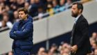 Tottenham manager  Mauricio Pochettino and Watford’s Quique Sanchez Flores look on during the match at Tottenham Hotspur Stadium. Photo:  Getty Images